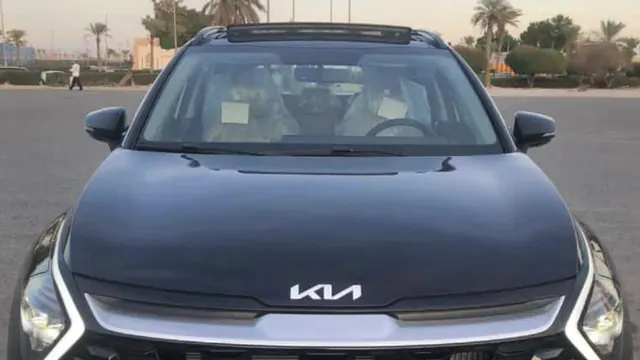 Dark Kia passenger sedan